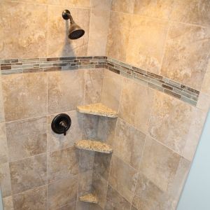 Granite Curb and Shelves in Bathroom